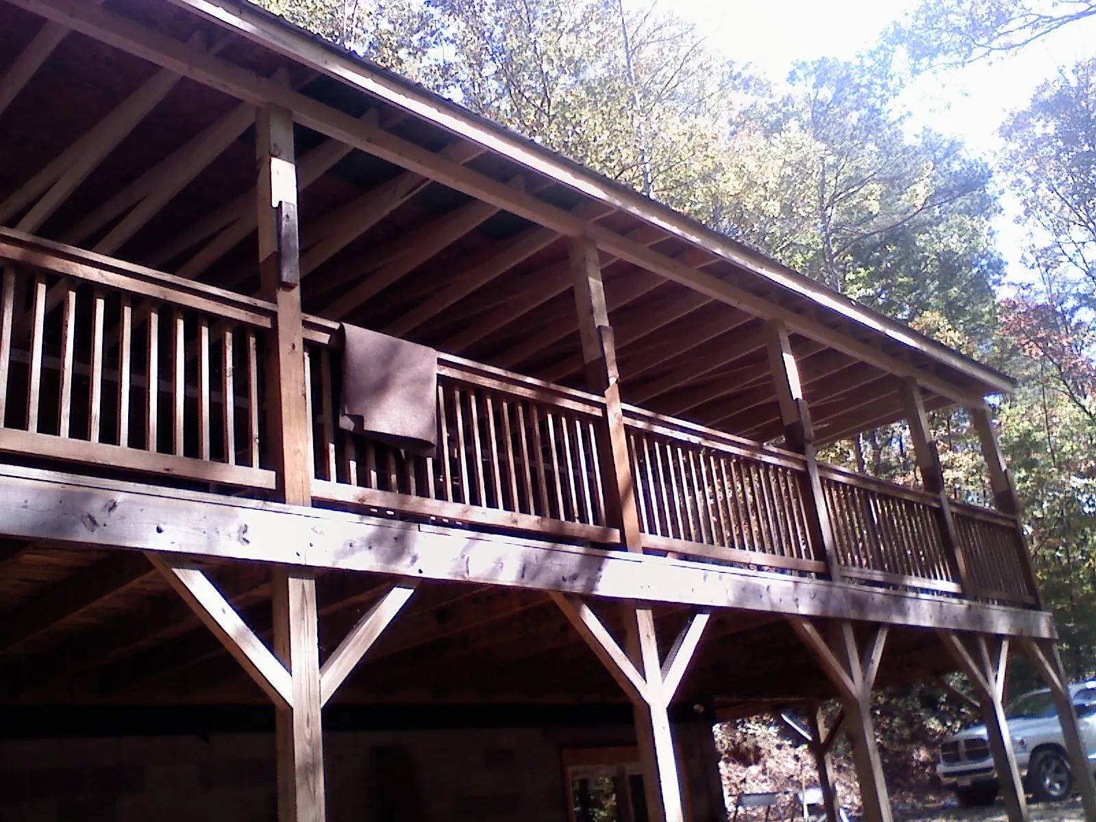 Timber framing under a new elevated porch and deck — Roof Leak Repair in Monona by Roofing Brothers